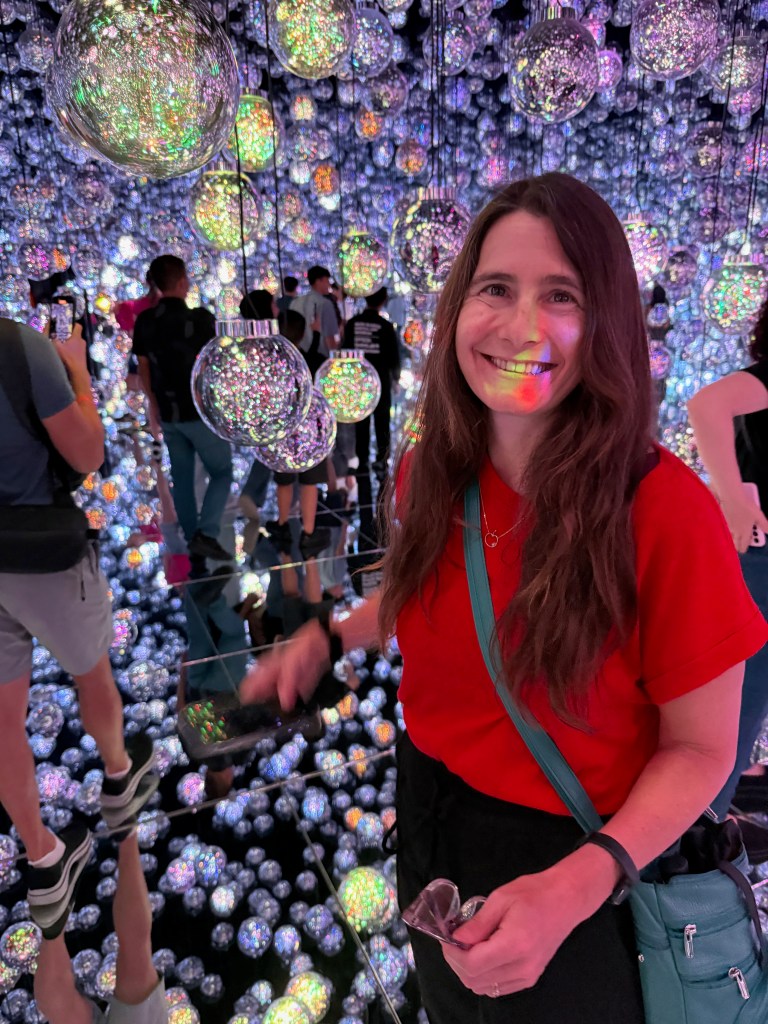 A woman at teamLab Borderless Tokyo