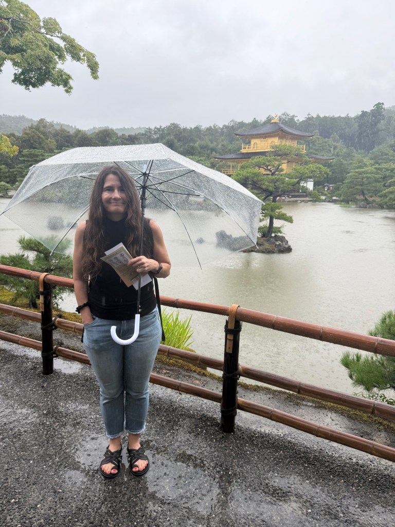 A woman at Kinkaku-ji Temple